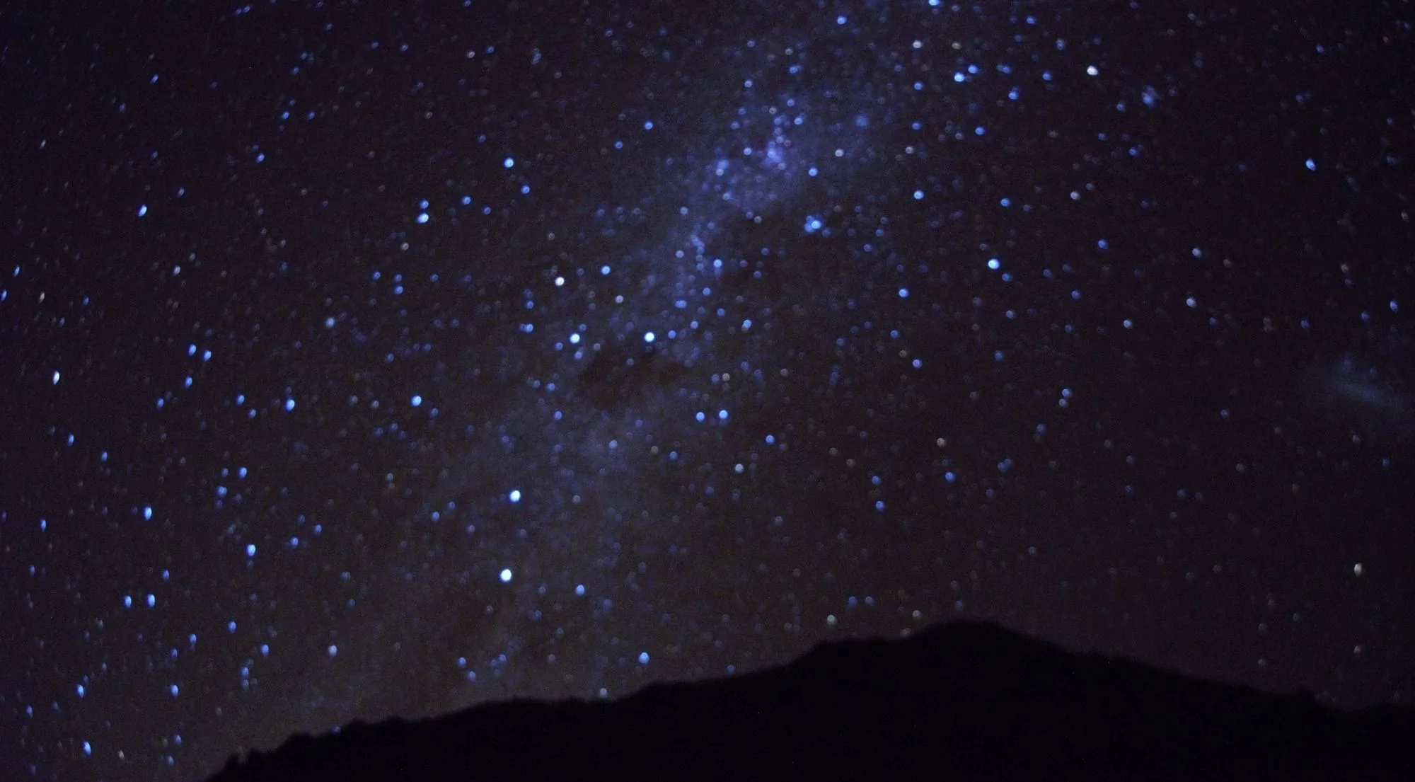 Milky Way above a dark hill silhouette in the Mackenzie Basin