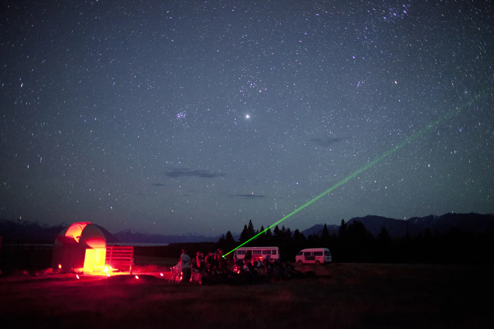 Laser beam and the Milky Way above the Cowan's Observatory site