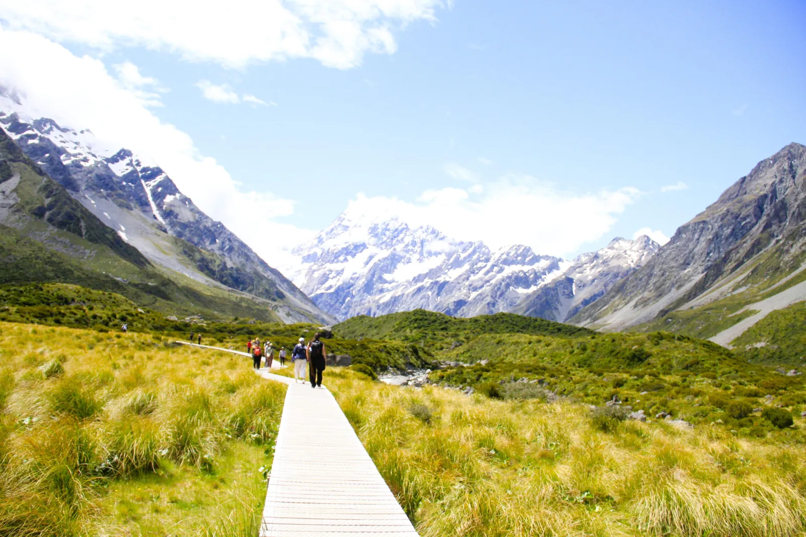 Hooker Valley Track boardwalk towards snow-capped Mount Cook